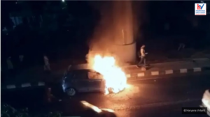 बड़खल फ्लाईओवर पर कार में लगी आग, यातायात ठप